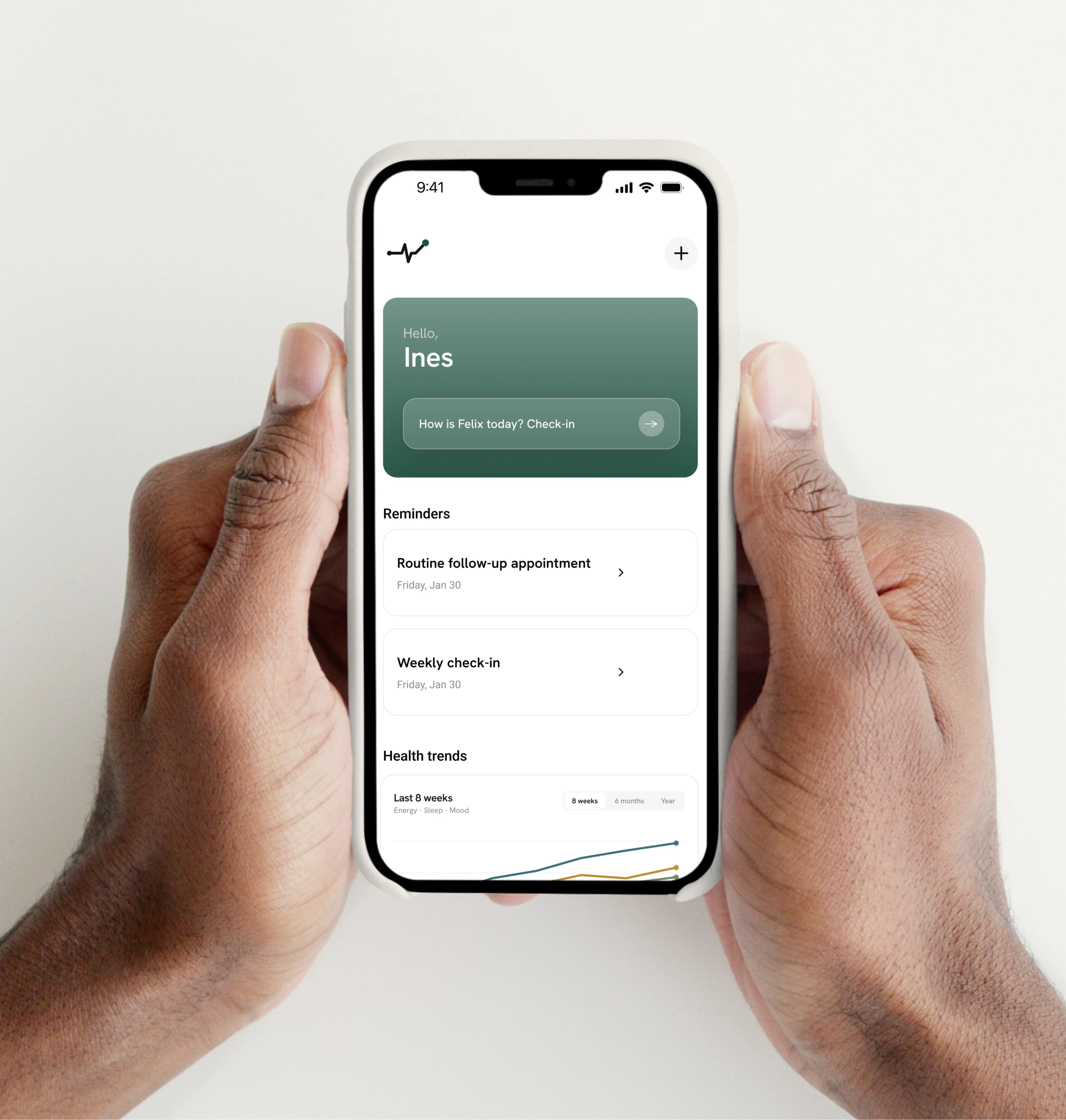 The RareJourney app home screen, held in two hands